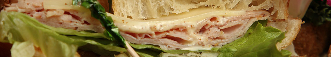 Eating Deli Sandwich at Italian Corner Deli restaurant in Norwalk, CT.